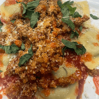 Beef Ravioli with sausage ragu