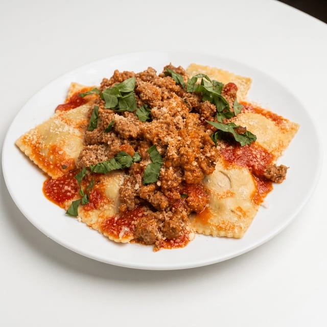 Beef Ravioli with Sausage Ragu.